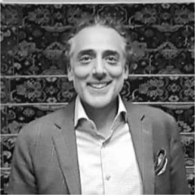 Headshot of Tahir Latif, greyscale